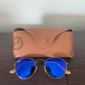 Ray Band round glasses with blue lenses. Ray ban style RB3447.